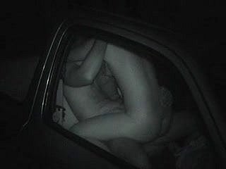 Voyeur films team of two in car